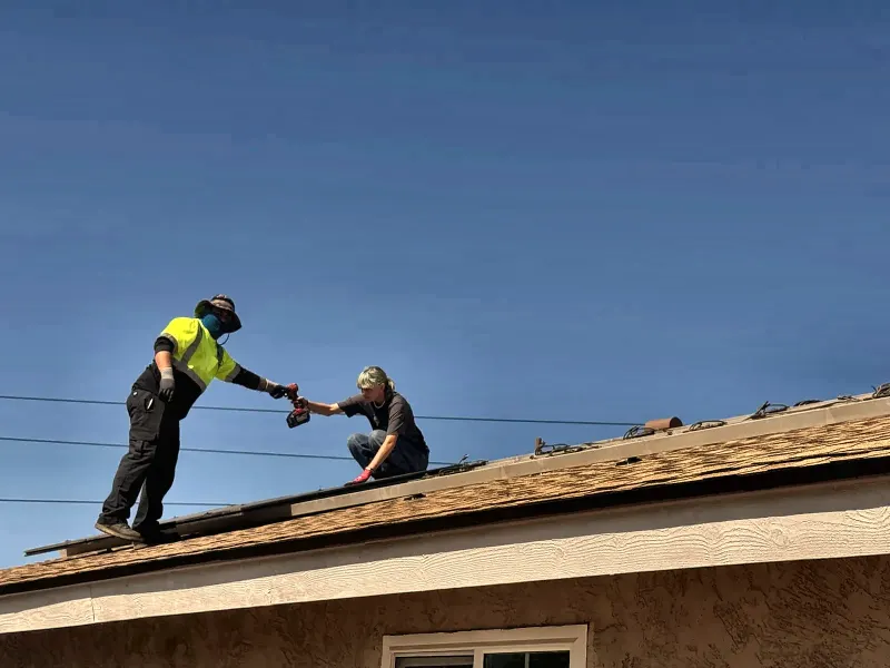 LTBL Energy crew working on a San Diego roof during a solar panel reinstall