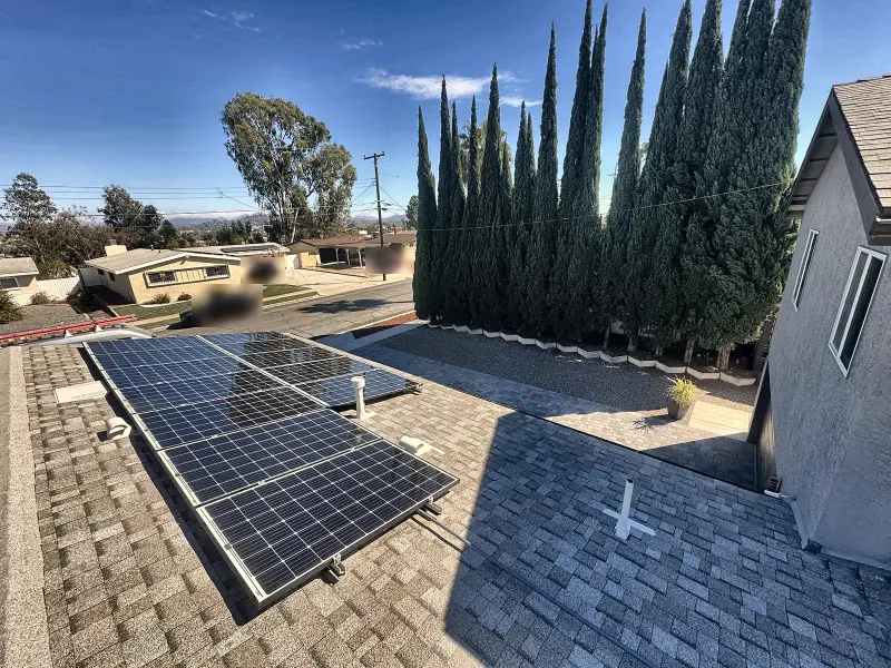 Solar array reinstalled on a gray shingle roof in San Diego